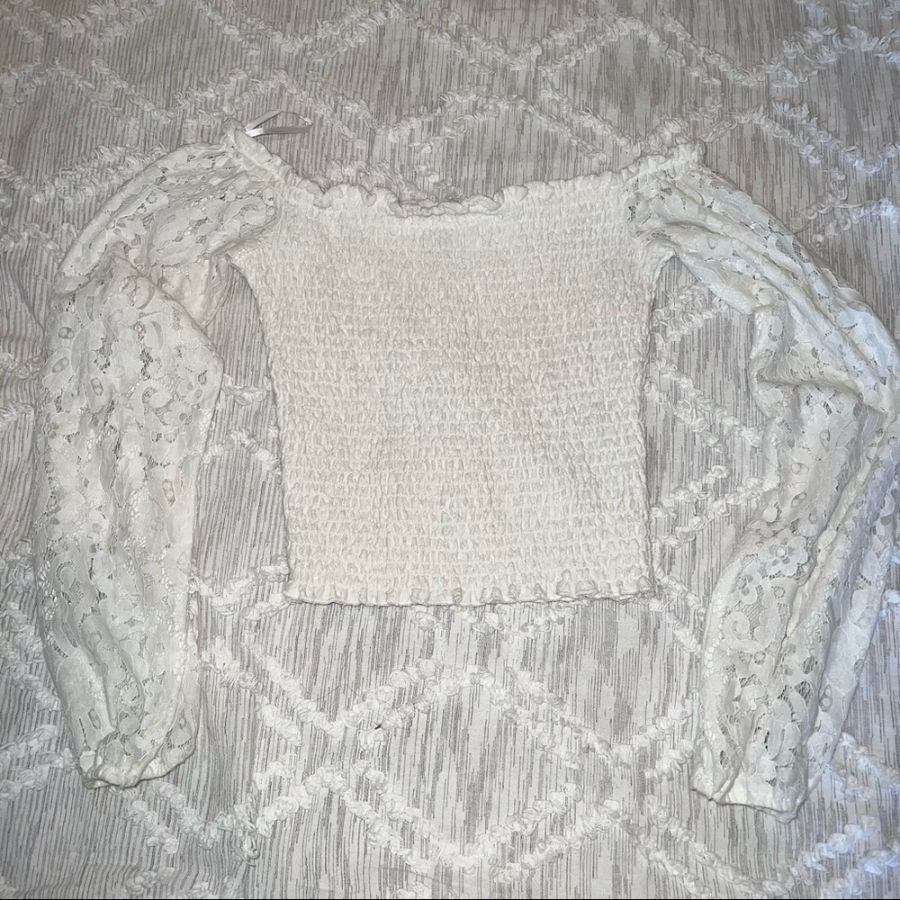 Smocked white top with lace sleeves